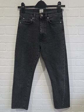 Toteme Twisted Slim Straight Jeans in Washed Black